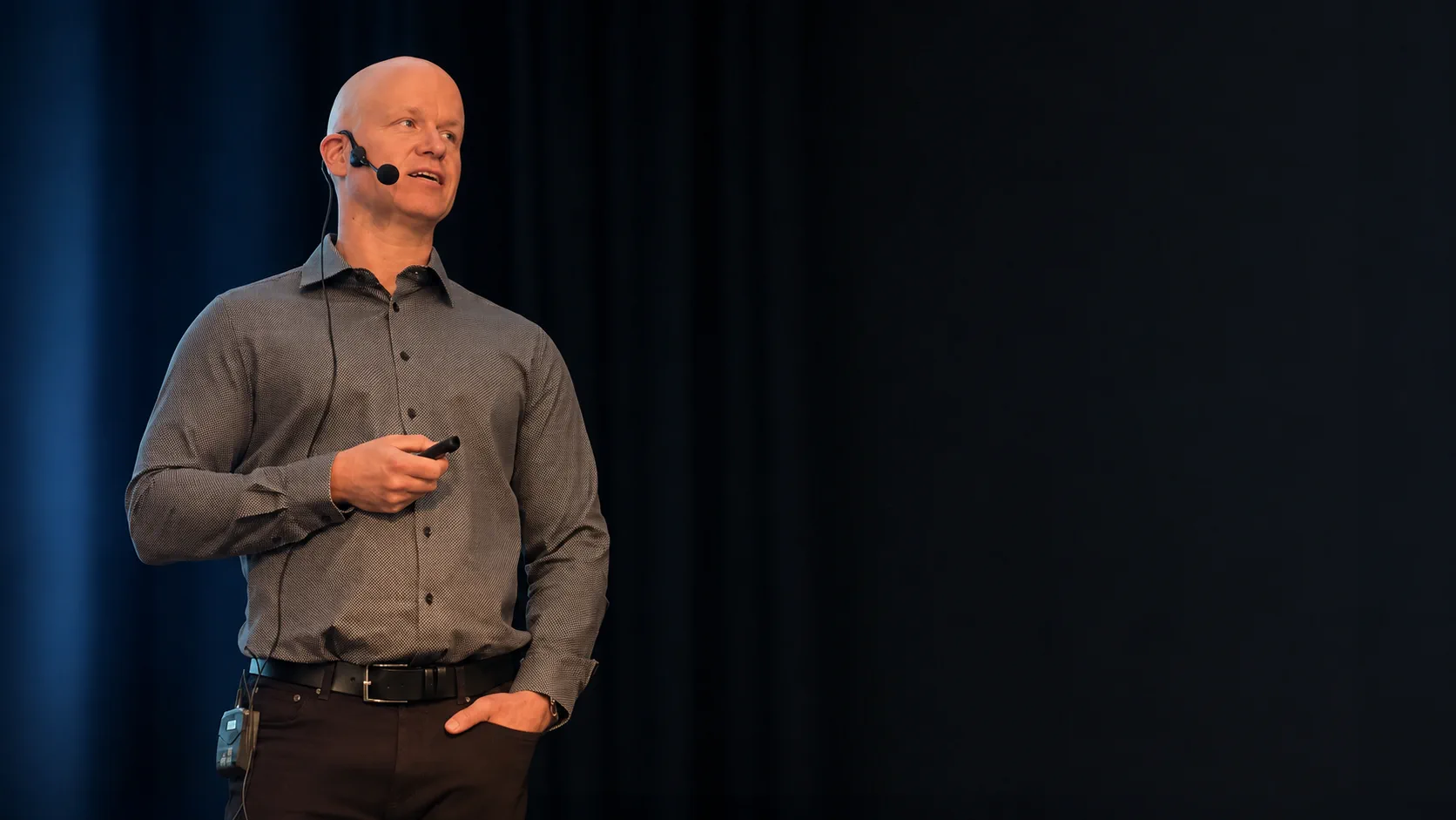 Janne Ikola speaking at a business event
